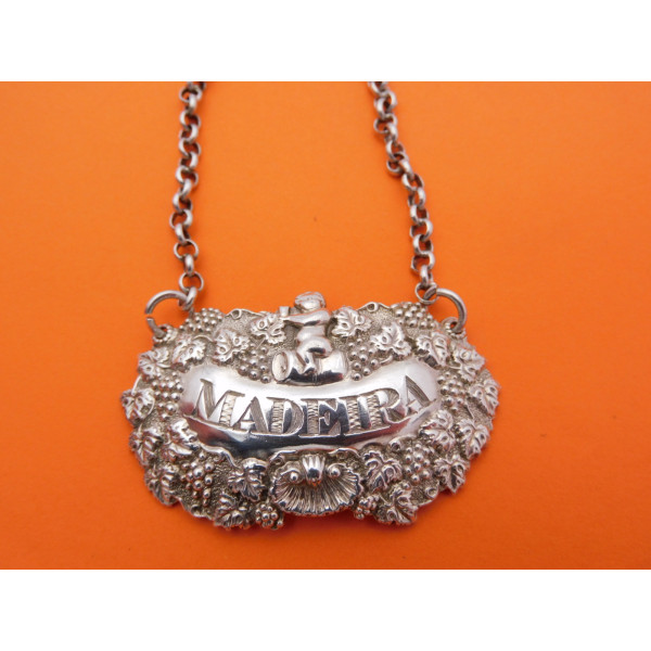 Boy on barrel silver Madeira wine label by William Bateman