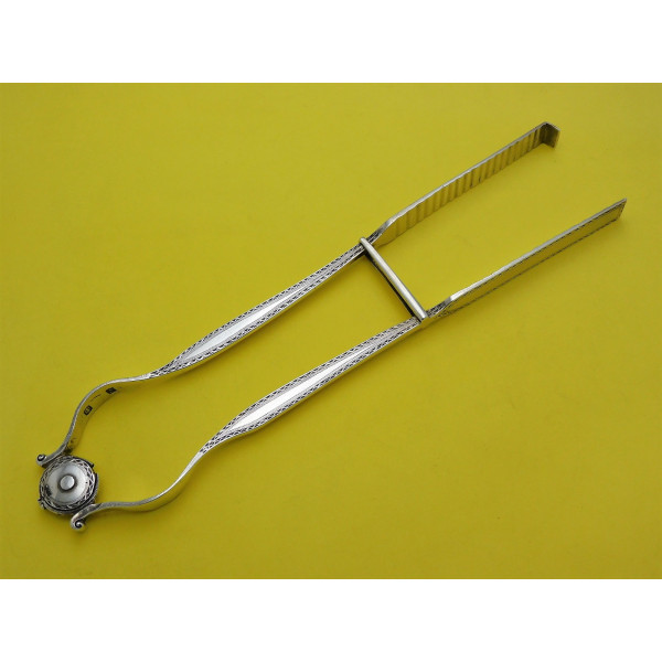 Bright cut Silver serving tongs by John bucket