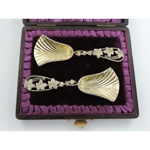 Cased pair silver gilt caddy spoon by A E Robinson Birmingham 1887