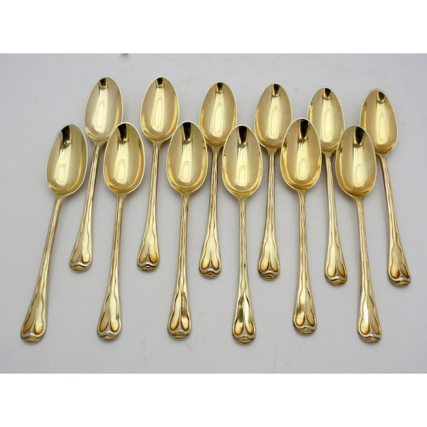 Decorated Hanoverian Silver gilt dessert spoons by Paul Storr