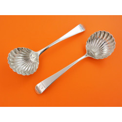 Pair Georgian silver sauce ladles with shell by bowls by Thomas Chawner
