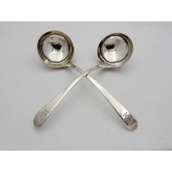 Pair silver duty dodger sauce ladles by Paul Callard