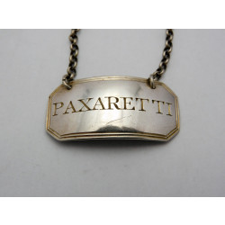 Paxaretti silver wine label by John Rich