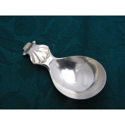 Shell silver caddy spoon by Thomas freeth 1809
