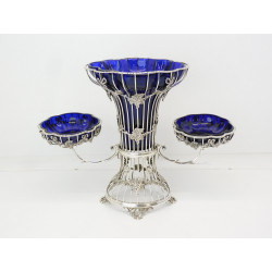 Silver epergne with blue glass liners 1909