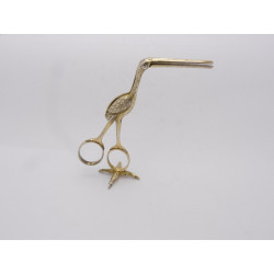 Silver gilt stork ribbon threaders by Eley Fearn Chawner