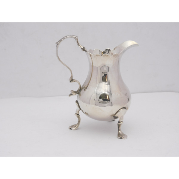 Tripod silver cream jug London 1762